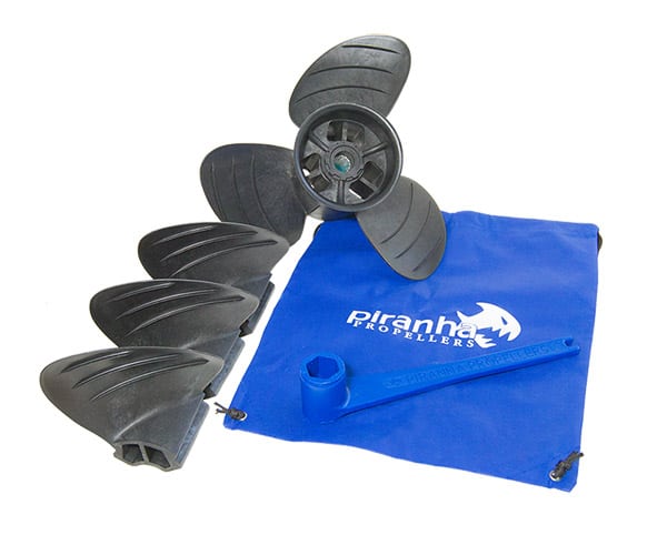 Piranha Propellers Propulsion Kit including a propeller, a full set of replacement blades, a floating prop wrench, and a mesh bag